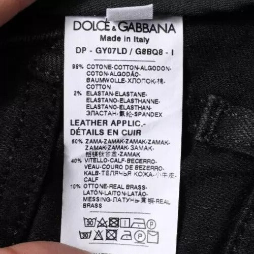 Jeans skinny en denim noir à logo Dolce & Gabbana en coton stretch, ajustés et modernes.