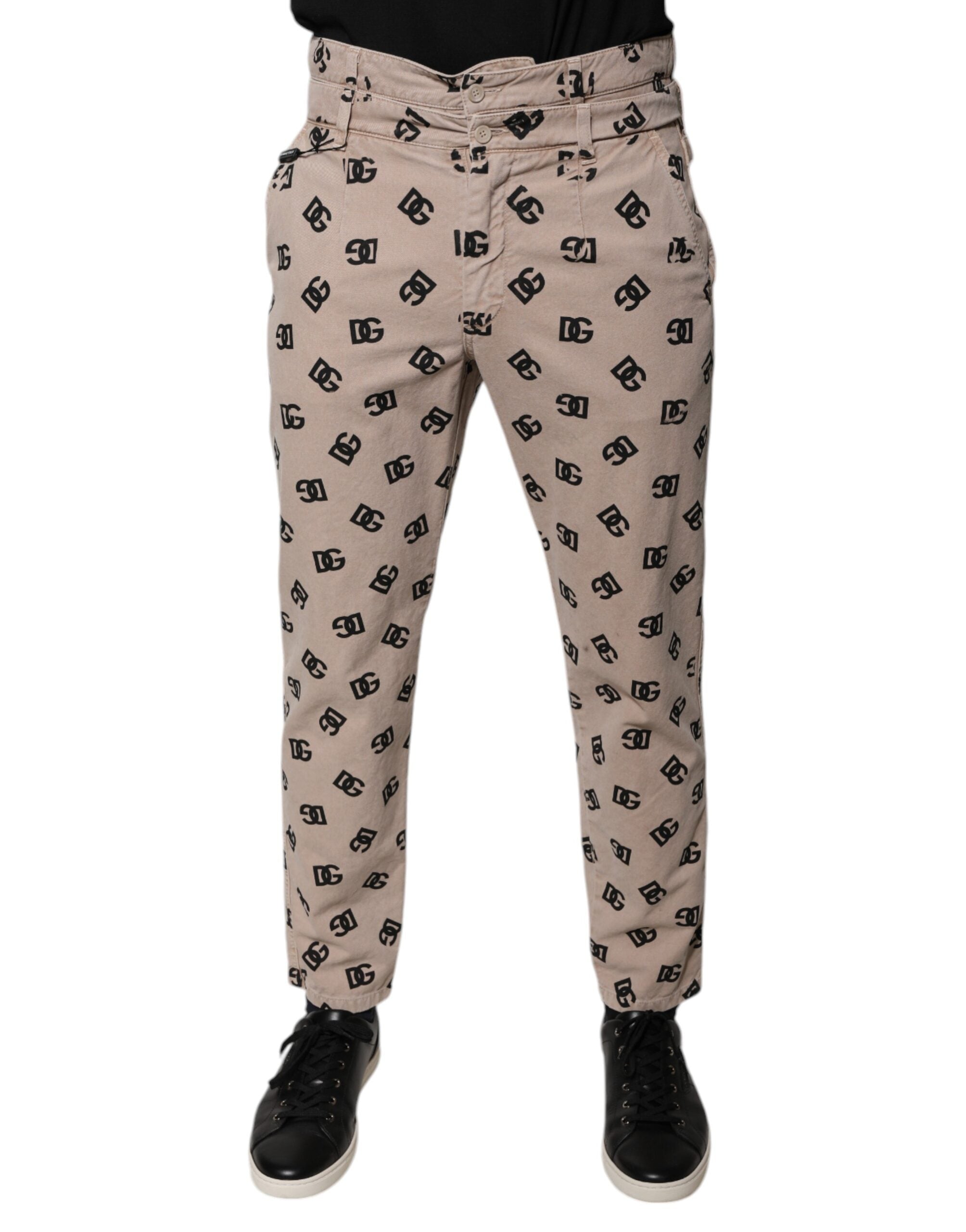 Jeans skinny en coton beige avec logo Dolce & Gabbana, détails en denim, coupe ajustée et style élégant.
