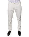 Pantalons skinny en denim blanc en coton de Dolce & Gabbana, style ajusté et tendance, vue de face sur fond neutre.