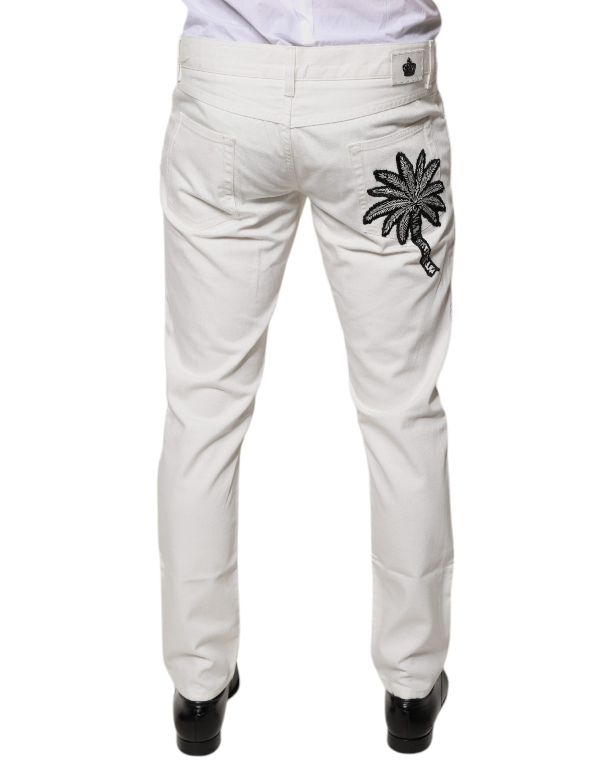 Jean skinny en denim blanc Dolce & Gabbana en coton, ajusté et moderne, visible sur l'image.