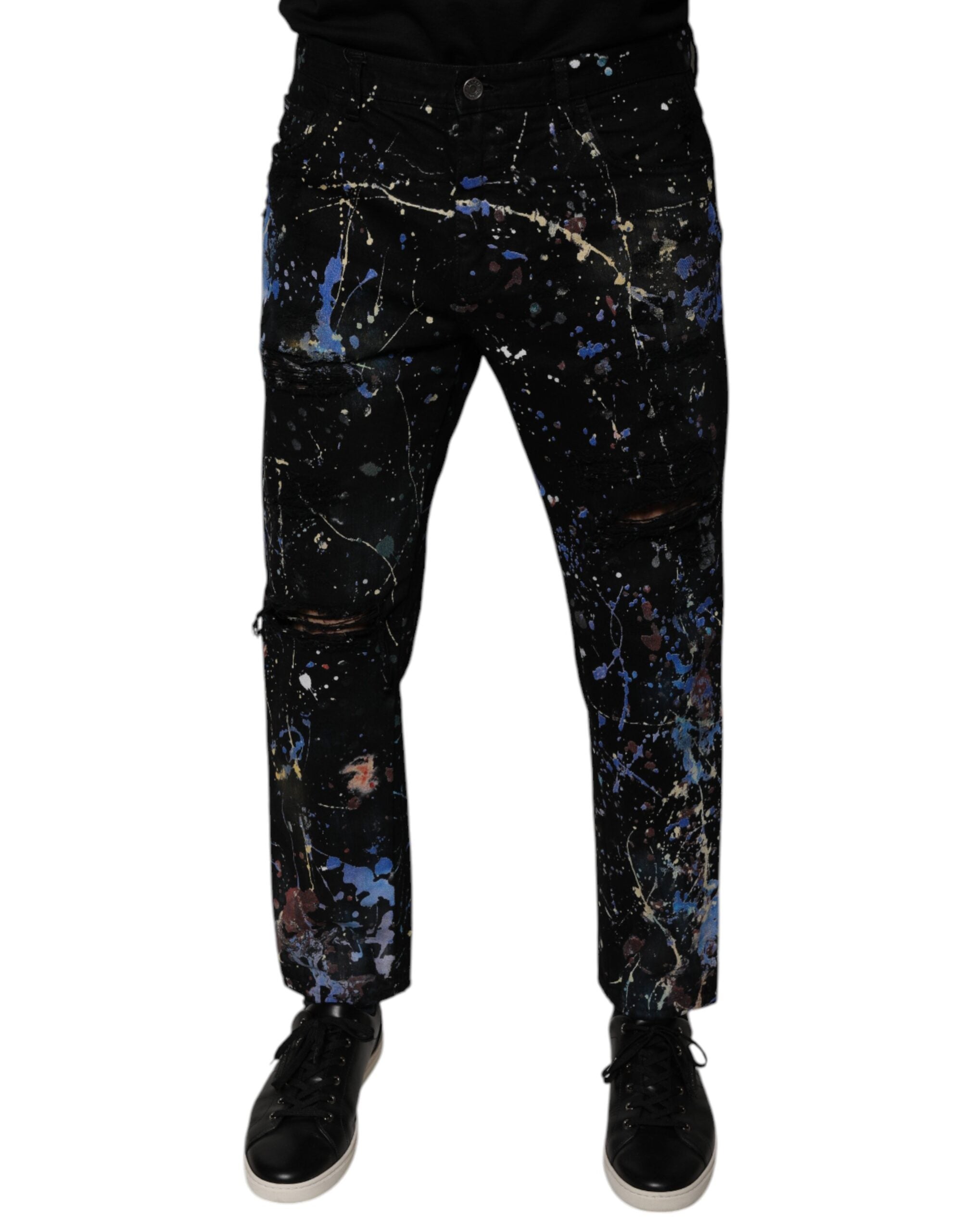 Jeans skinny en denim coton noir avec éclaboussures de couleur, fabriqués par Dolce & Gabbana.