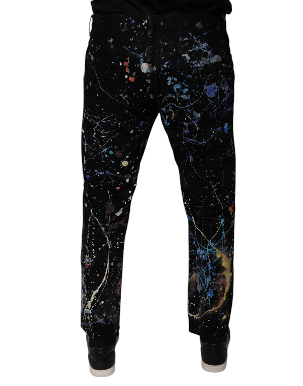 Jeans skinny en denim coton noir avec éclaboussures de couleur de Dolce & Gabbana, détails modernes et style élégant.
