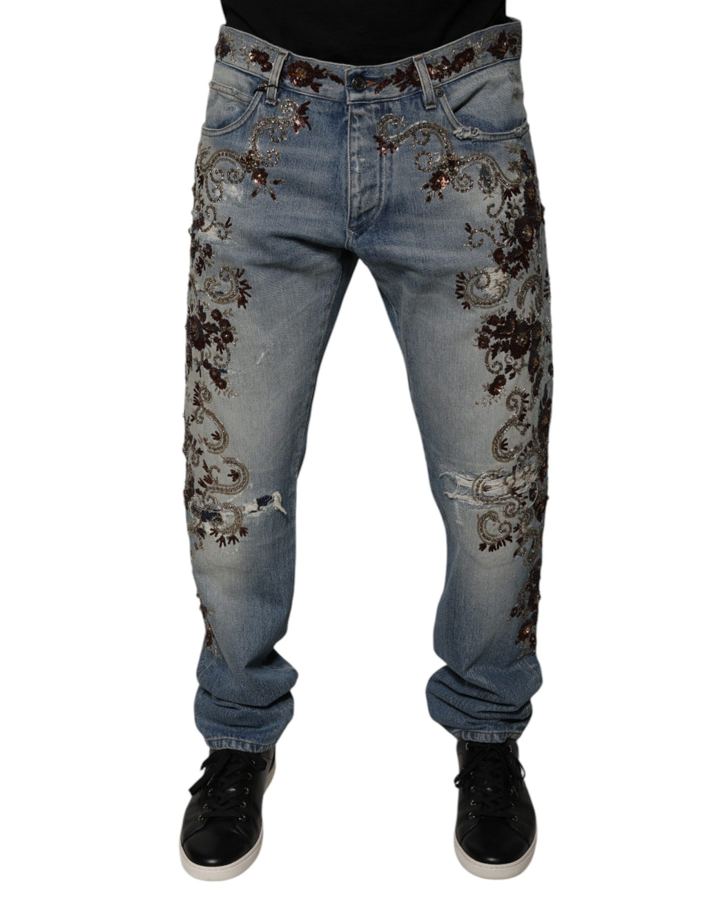 Jeans skinny en denim brodé Dolce & Gabbana Light Blue, coupe ajustée et détails élégants visibles en gros plan.