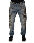 Jeans skinny en denim brodé Dolce & Gabbana Light Blue, coupe ajustée et détails de broderie visibles.