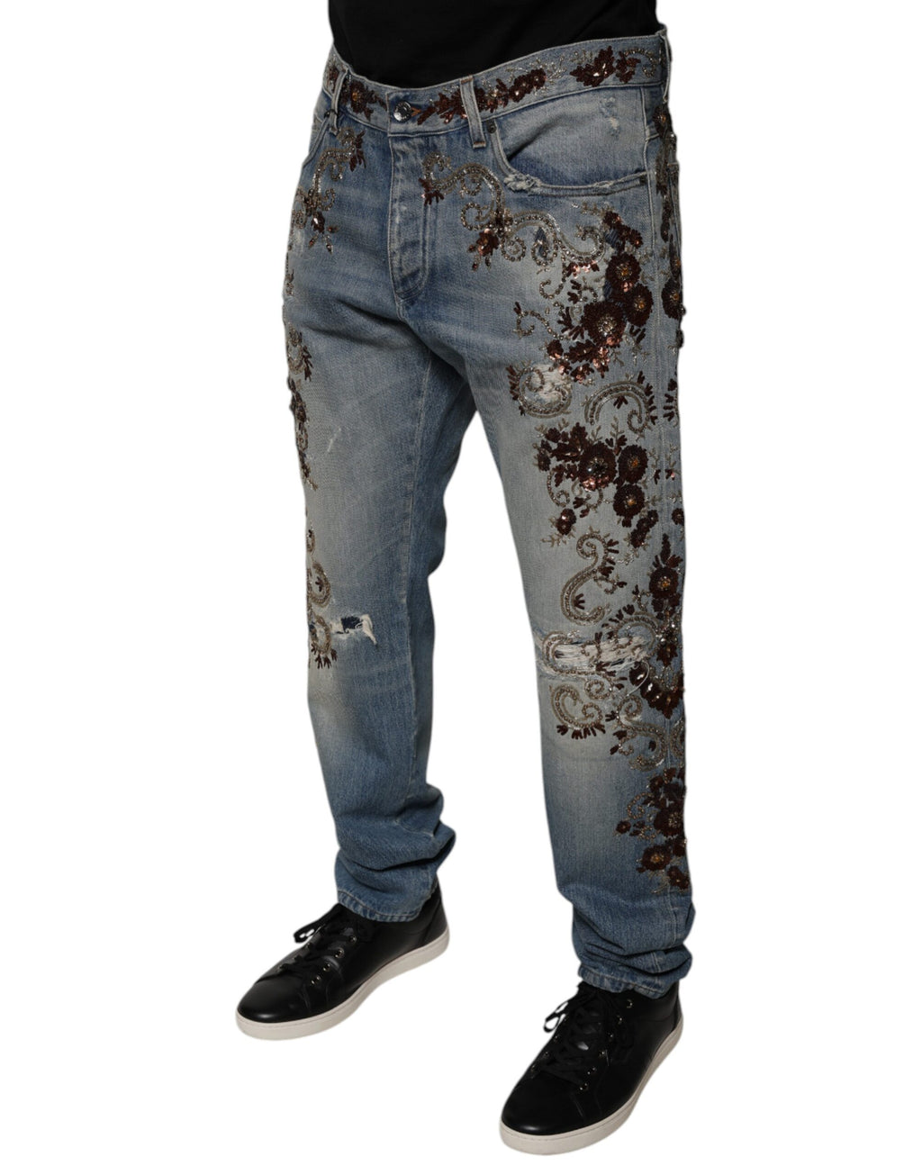 Jeans slim en denim bleu clair Dolce & Gabbana Light Blue avec broderies délicates visibles sur l'image.