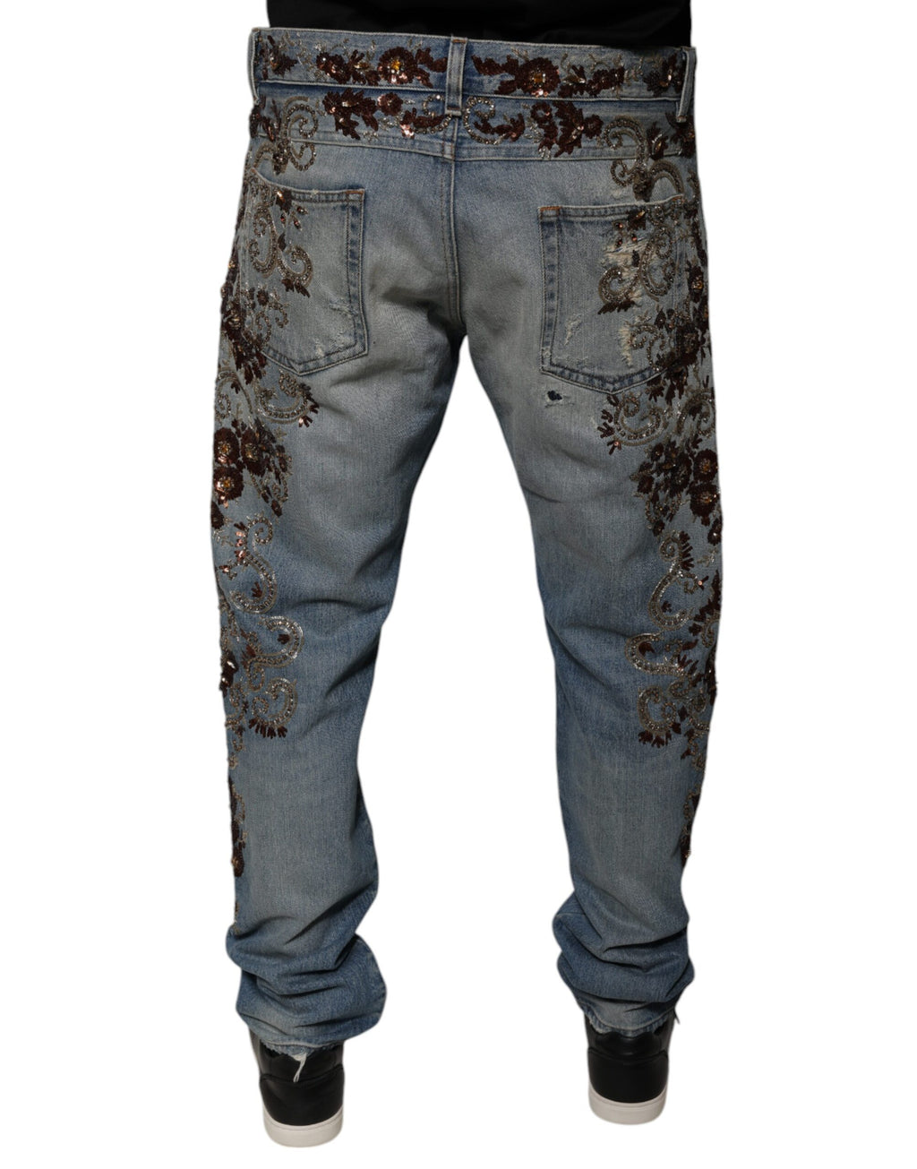 Jeans skinny en denim brodé Dolce & Gabbana Light Blue, coupe ajustée et détail de broderie sur le jean.