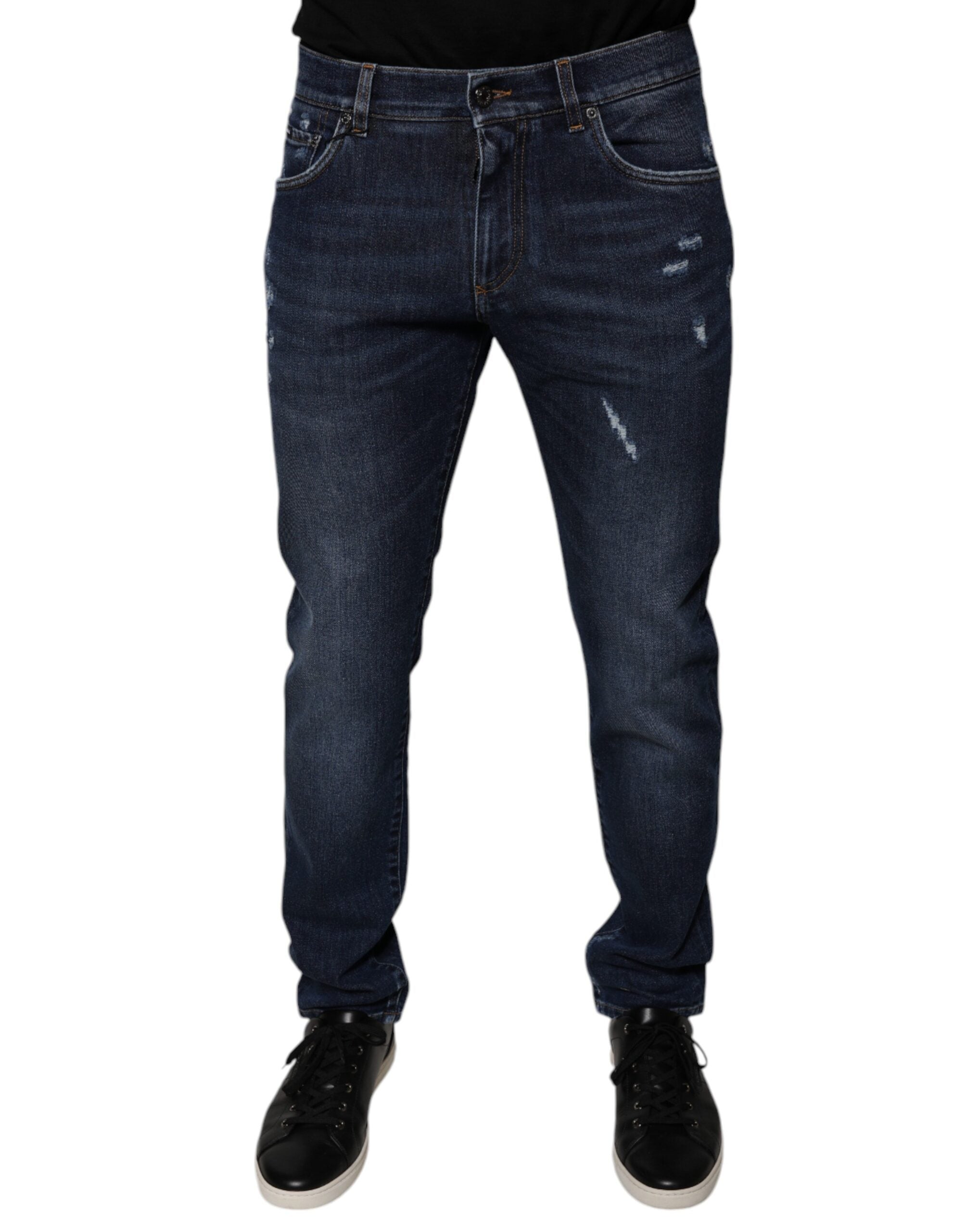 Jeans skinny en denim coton bleu foncé Dolce & Gabbana avec logo, visible sur l'image.