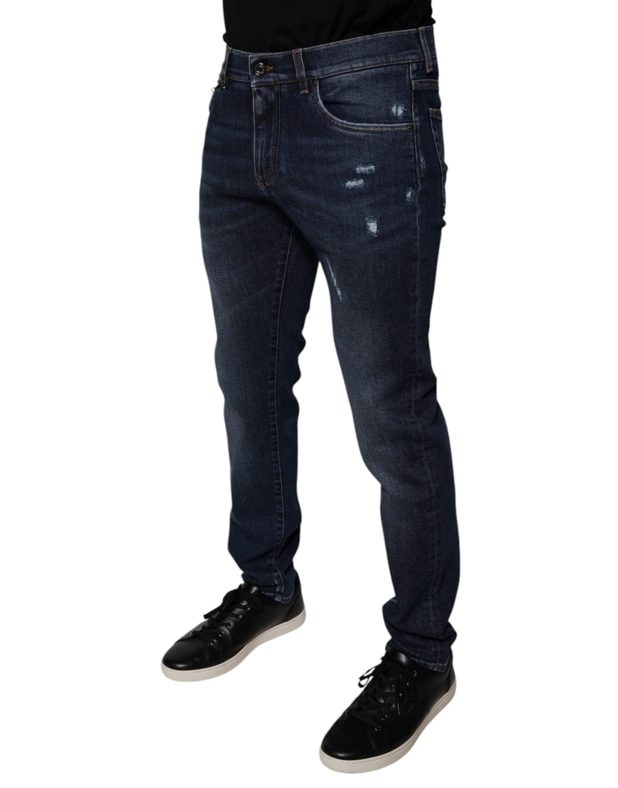 Jeans skinny en denim coton bleu foncé Dolce & Gabbana avec logo, vue de face.