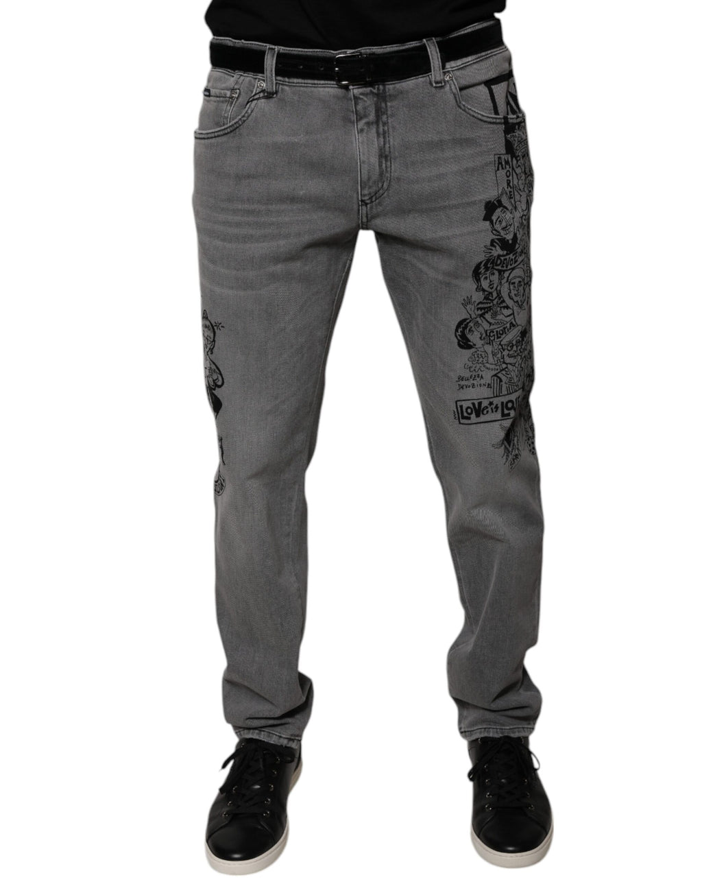 Jeans skinny en denim coton gris avec impression graphique Dolce & Gabbana, visible avec détails de design moderne.