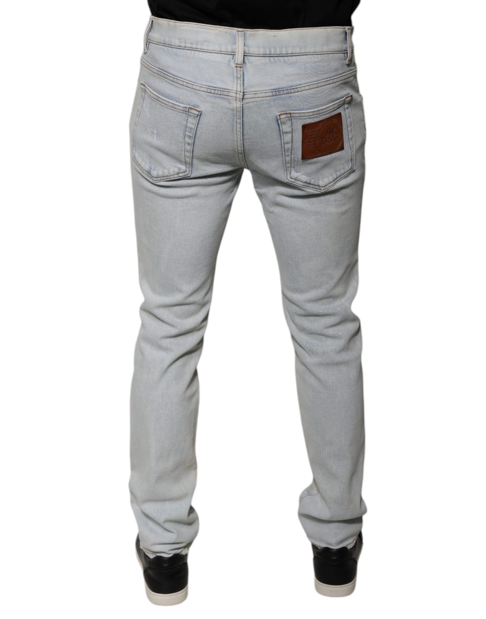 Jeans skinny déchirés en coton mélangé Dolce & Gabbana Light Blue, style décontracté et tendance.