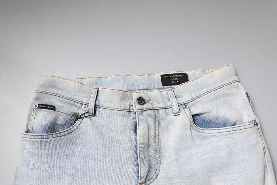 Jeans skinny déchirés en coton mélangé Dolce & Gabbana Light Blue, style décontracté et tendance.