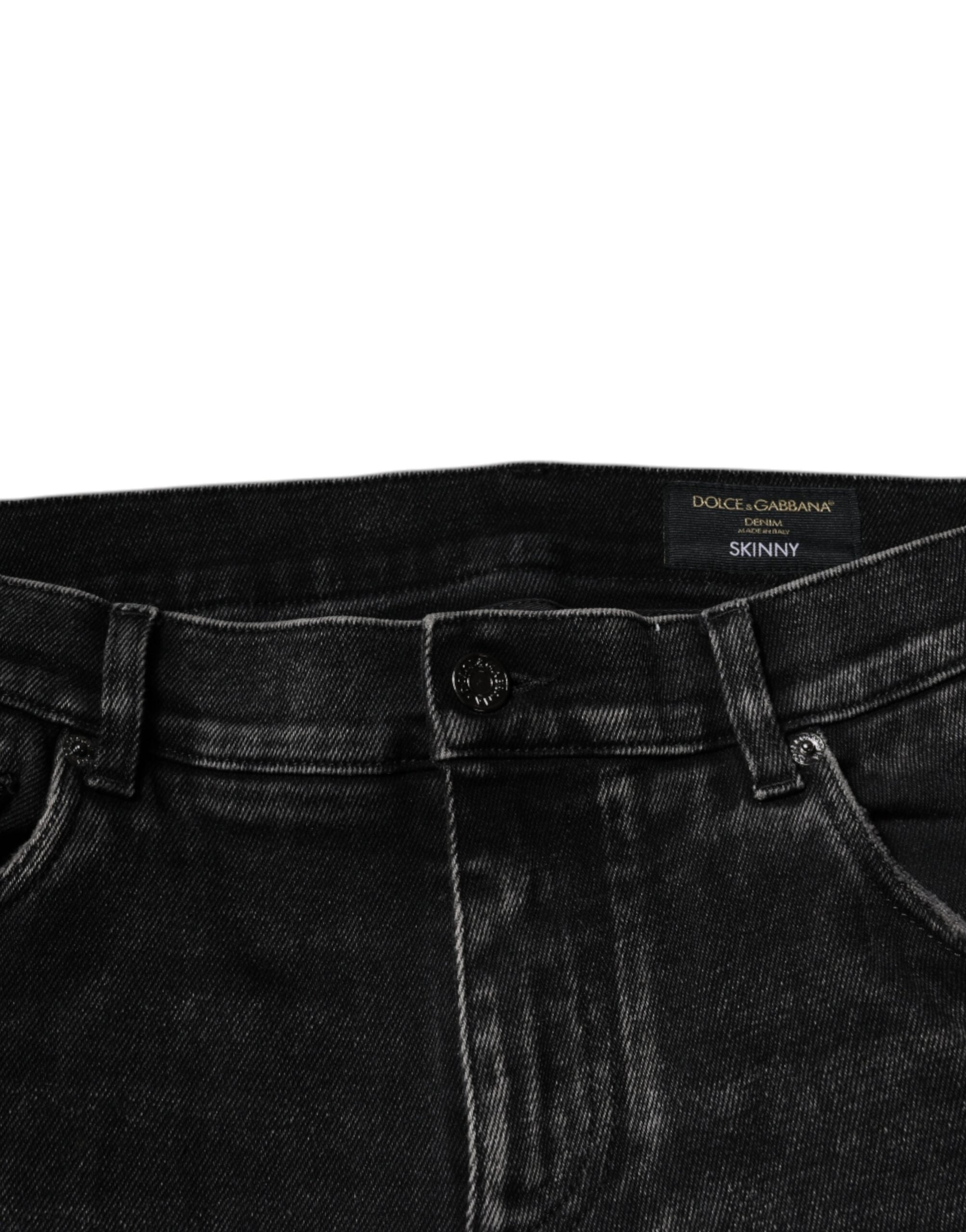 Jeans skinny en coton stretch noir Dolce & Gabbana pour homme, coupe ajustée et moderne, visible en image.