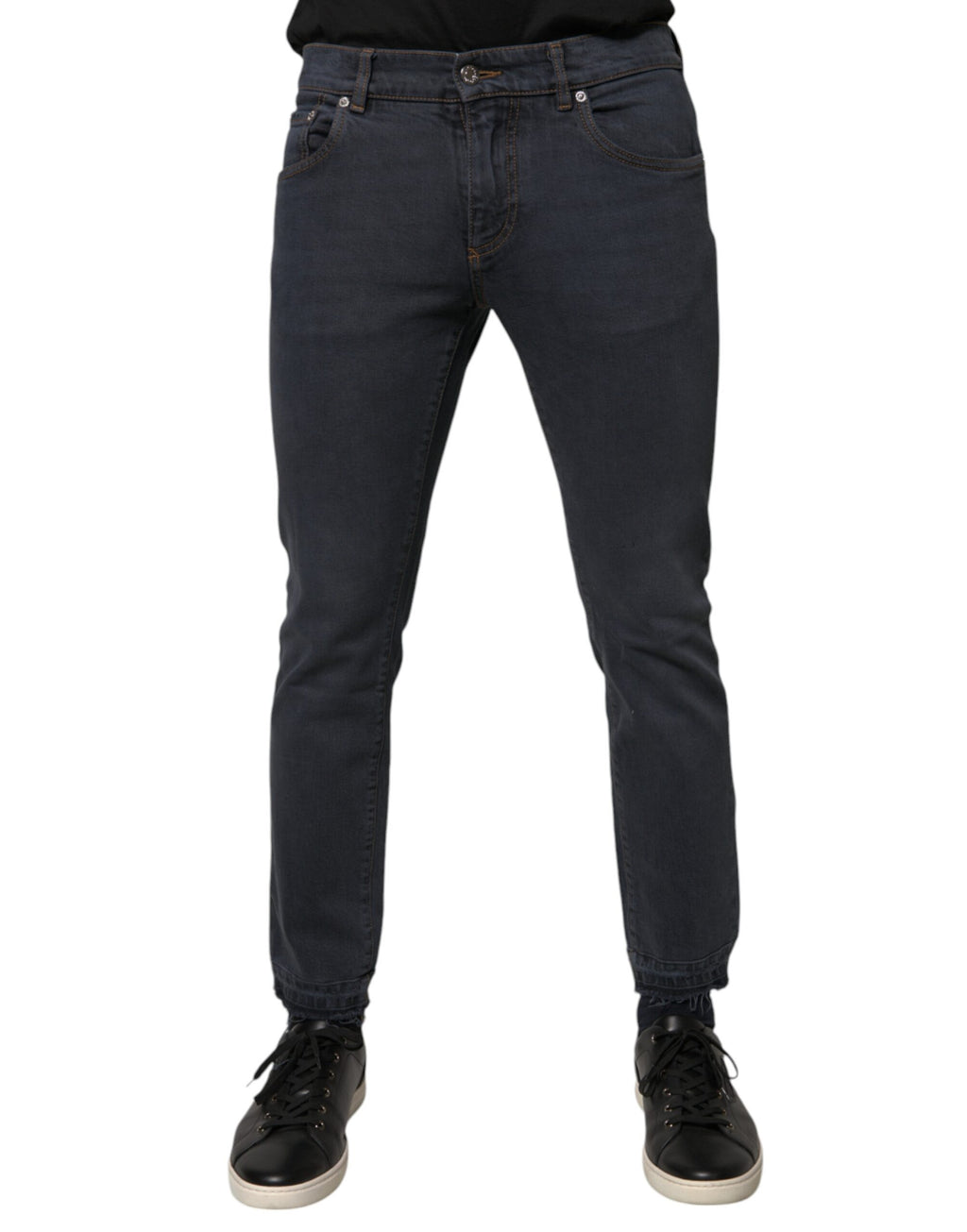 Jeans slim en coton gris foncé de Dolce & Gabbana, coupe skinny, avec détails de couture visibles.