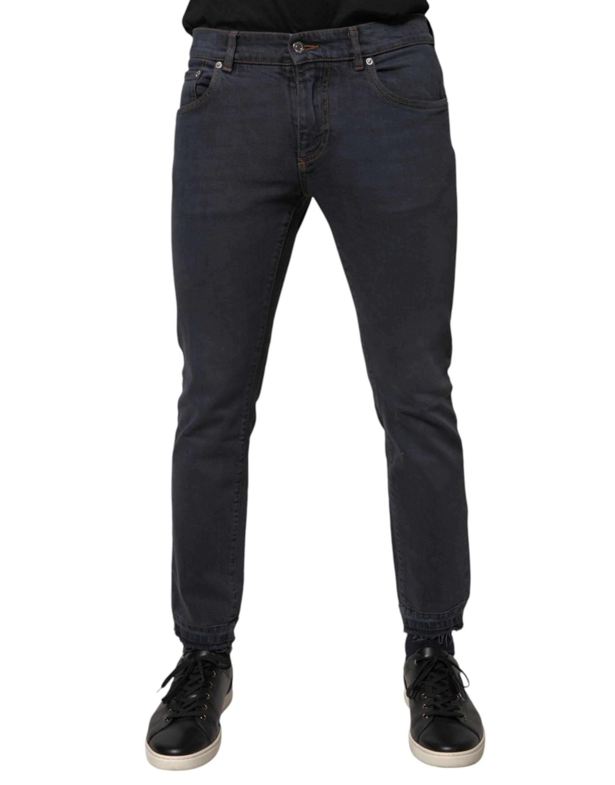 Jeans slim en coton gris foncé de Dolce & Gabbana, coupe skinny, avec détails de couture visibles.