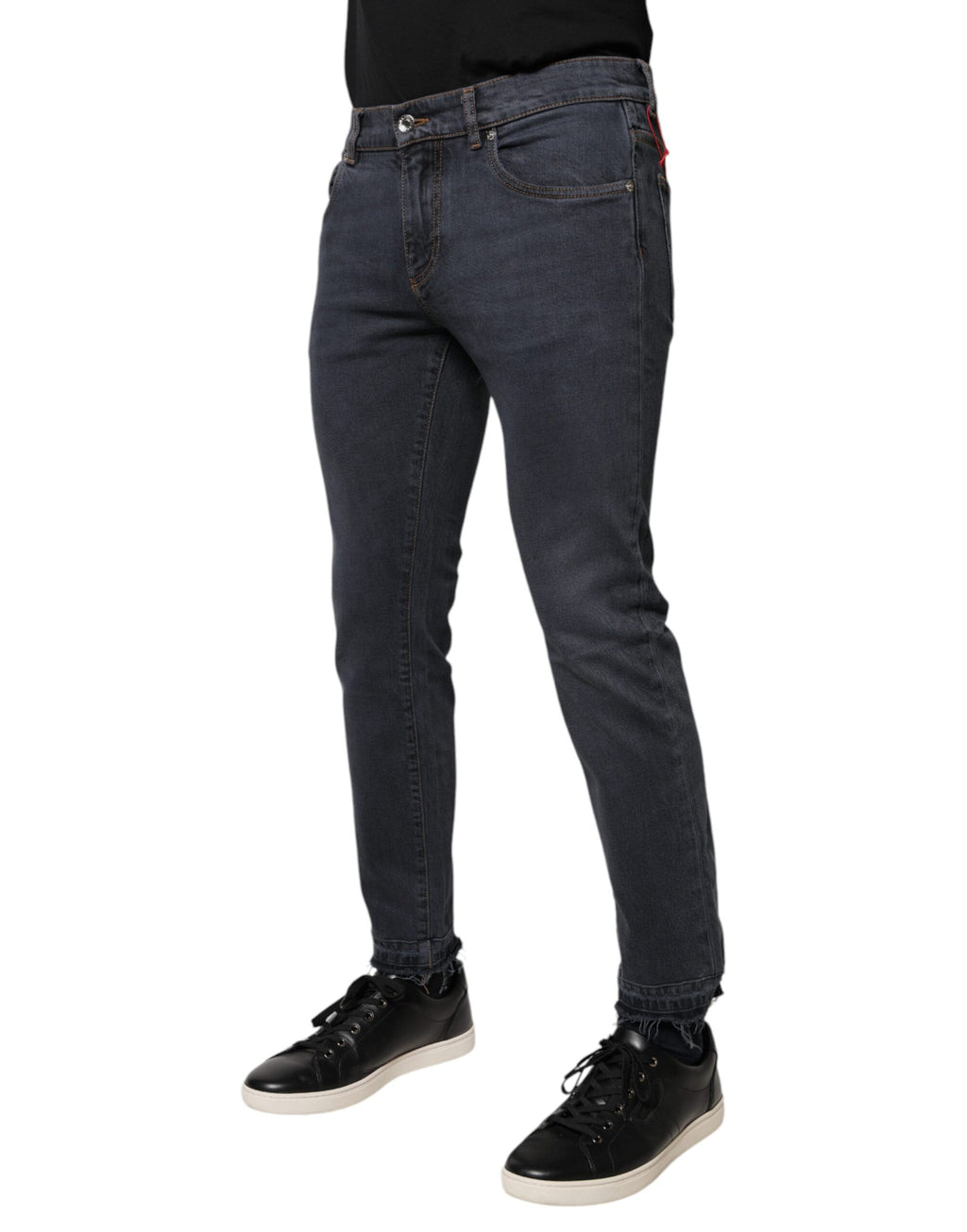 Jeans skinny en denim gris foncé en coton de Dolce & Gabbana, coupe ajustée et détail moderne visible dans l'image.