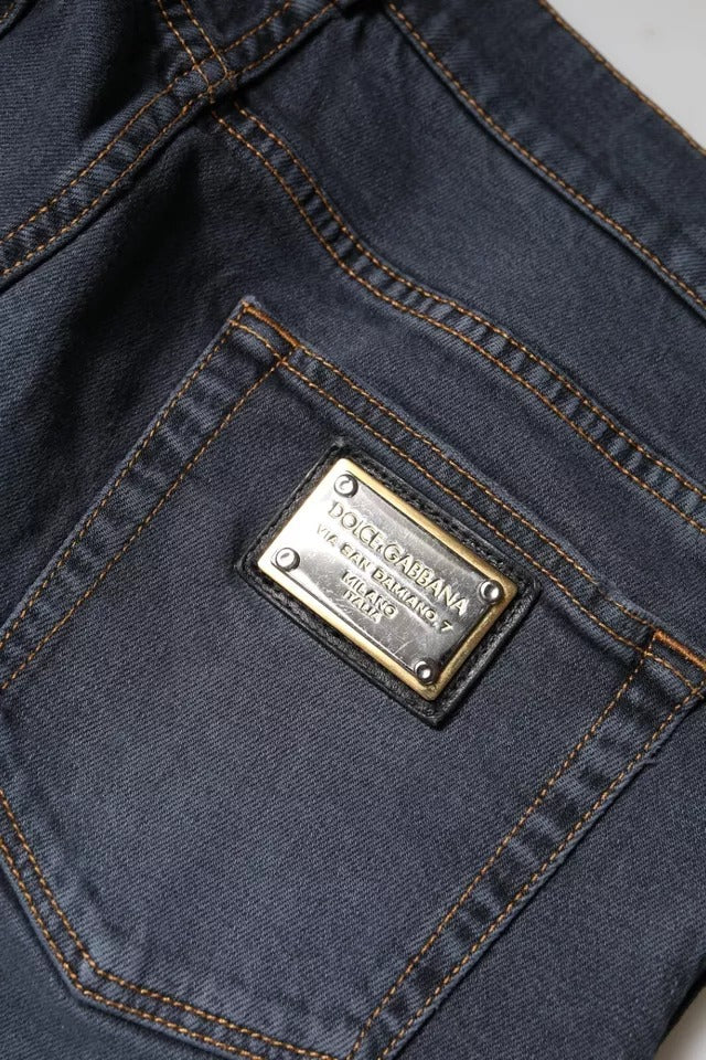 Jeans skinny en denim gris foncé Dolce & Gabbana en coton, vue de face, mettant en valeur la coupe ajustée et la texture du tissu.