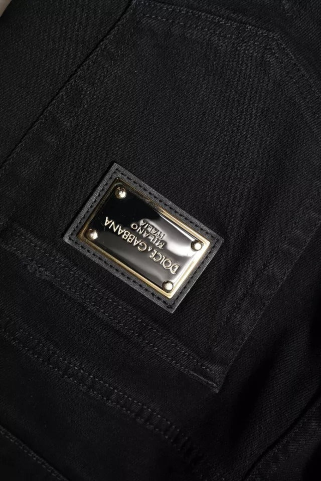 Jeans skinny en denim noir tacheté avec logo Dolce & Gabbana en coton, style décontracté et tendance.