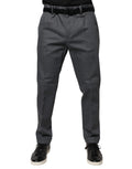 Pantalon de costume gris fuselé Dolce & Gabbana pour homme, coupe élégante et finition soignée.