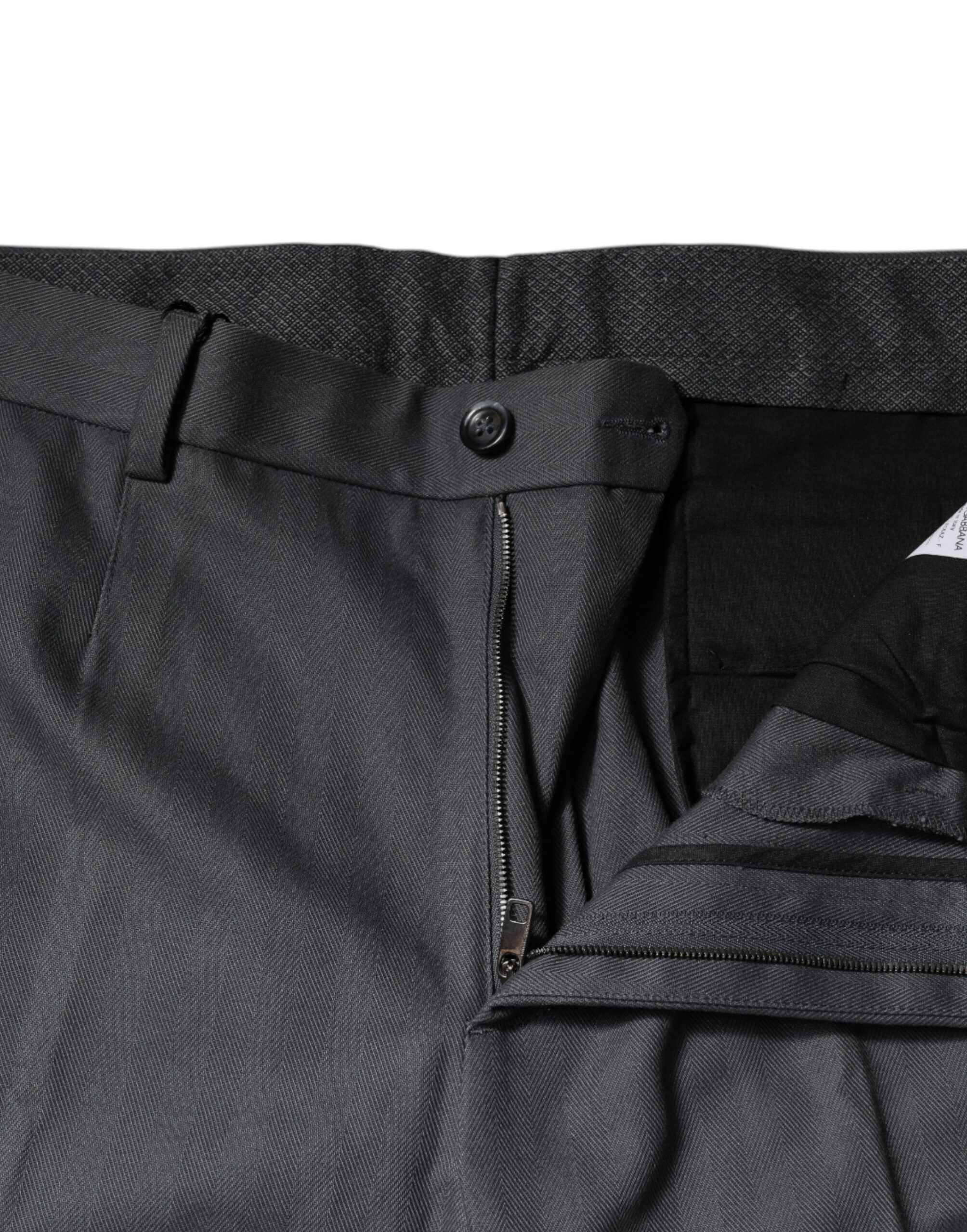 Pantalons de costume gris Dolce & Gabbana pour homme, coupe tapered, en tissu élégant et classique.