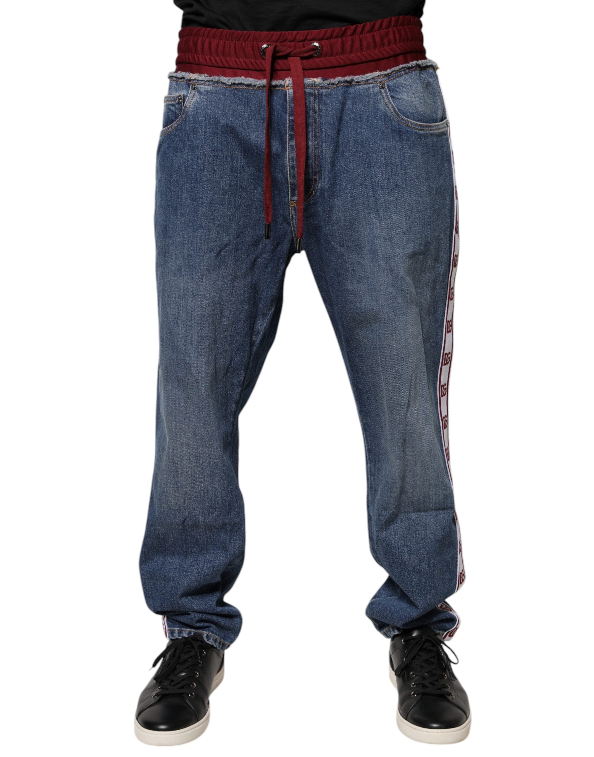 Jean droit en denim stretch bleu Dolce & Gabbana en coton, visible avec poches et couture détaillée.
