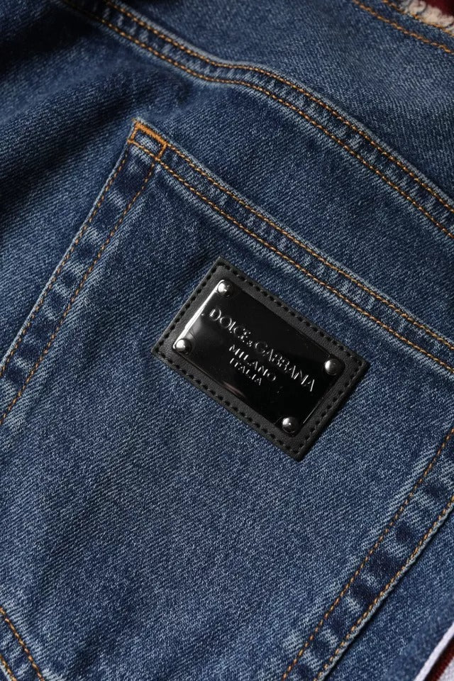 Jeans en denim droit extensible en coton bleu Dolce & Gabbana, vue de face avec détails de couture visibles.