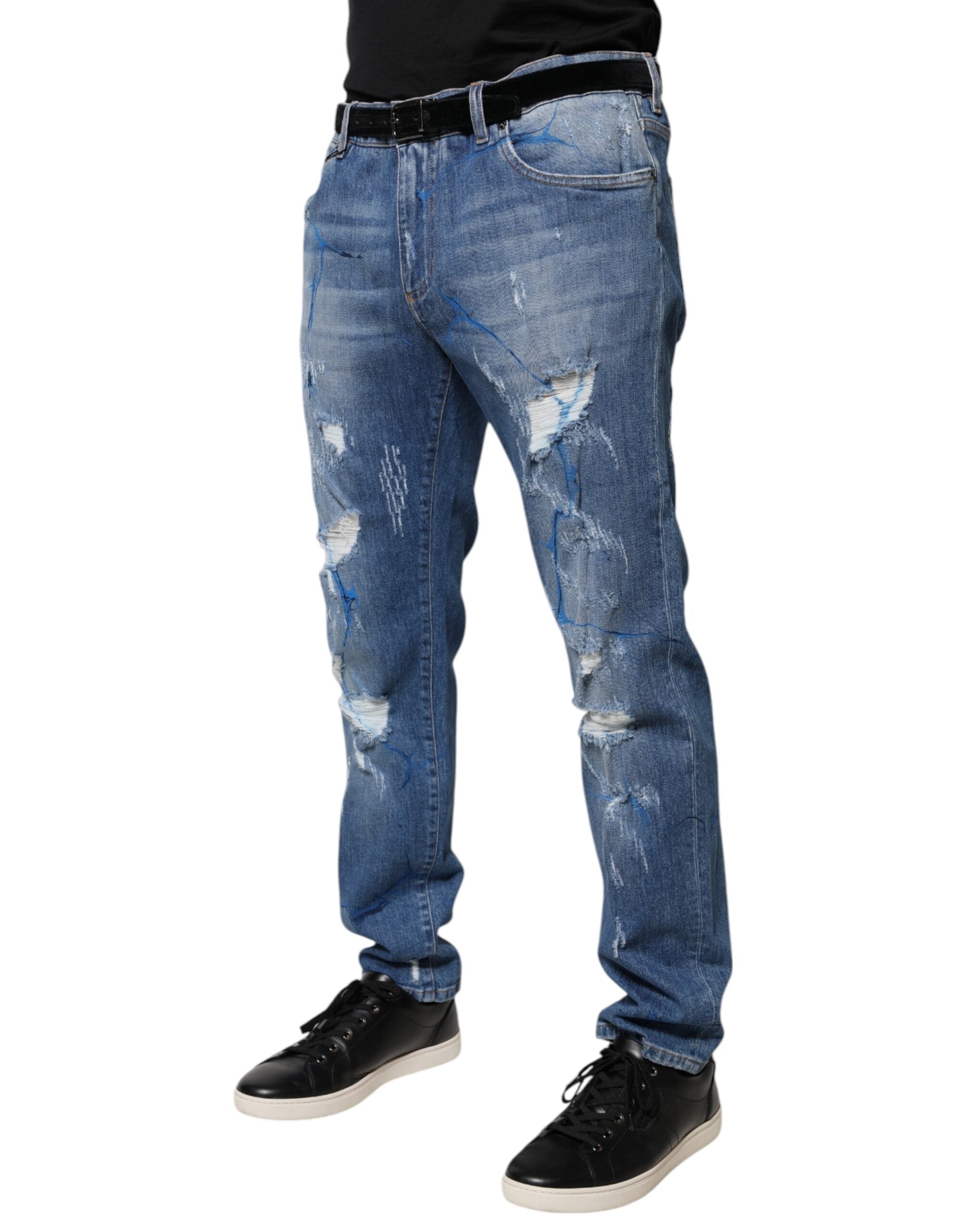 Jeans skinny en denim stretch bleu Dolce & Gabbana avec déchirures, coupe ajustée et style décontracté.