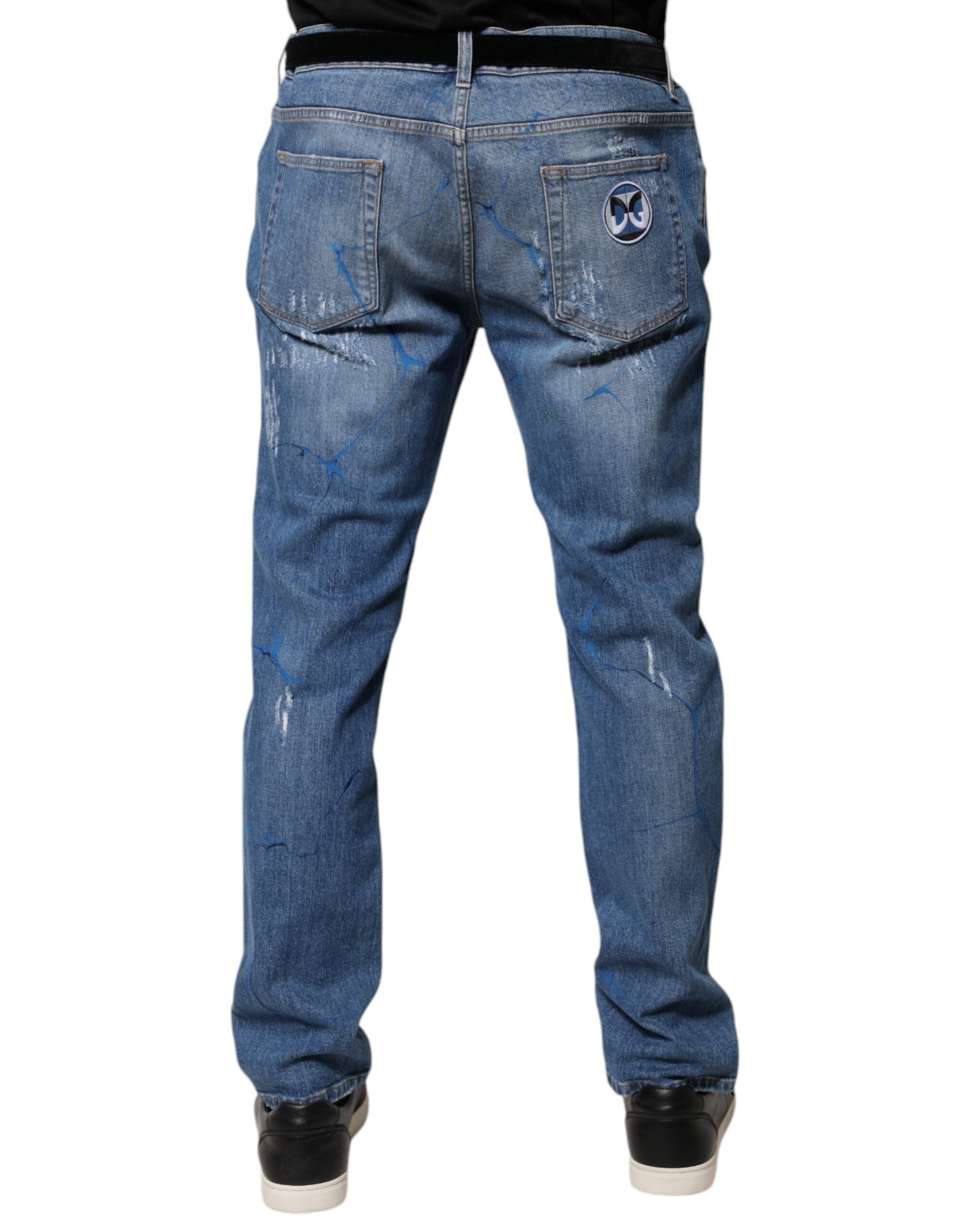 Jeans skinny en denim tissé stretch bleu Dolce & Gabbana avec déchirures, coupe ajustée et style décontracté.