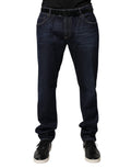 Jeans skinny en denim coton bleu foncé de Dolce & Gabbana, vue de face, avec détails de couture et ceinture.