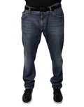 Jeans skinny en denim coton bleu foncé Dolce & Gabbana avec logo, vue de face sur un mannequin.