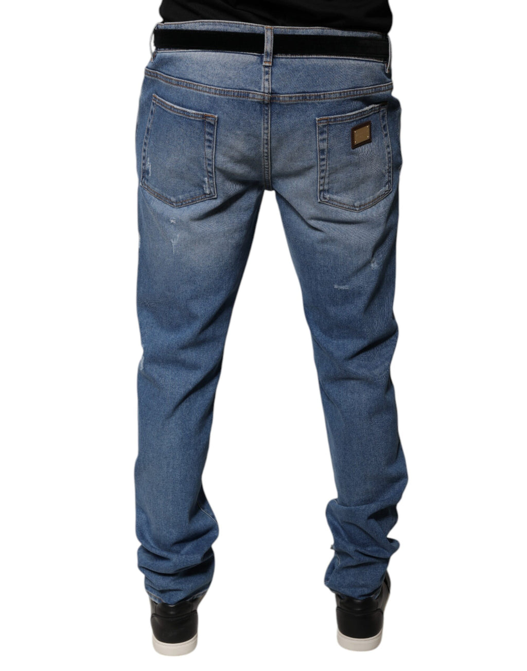 Jeans skinny en denim coton pour homme de Dolce & Gabbana Light Blue, montrant la coupe ajustée et le détail du tissu.