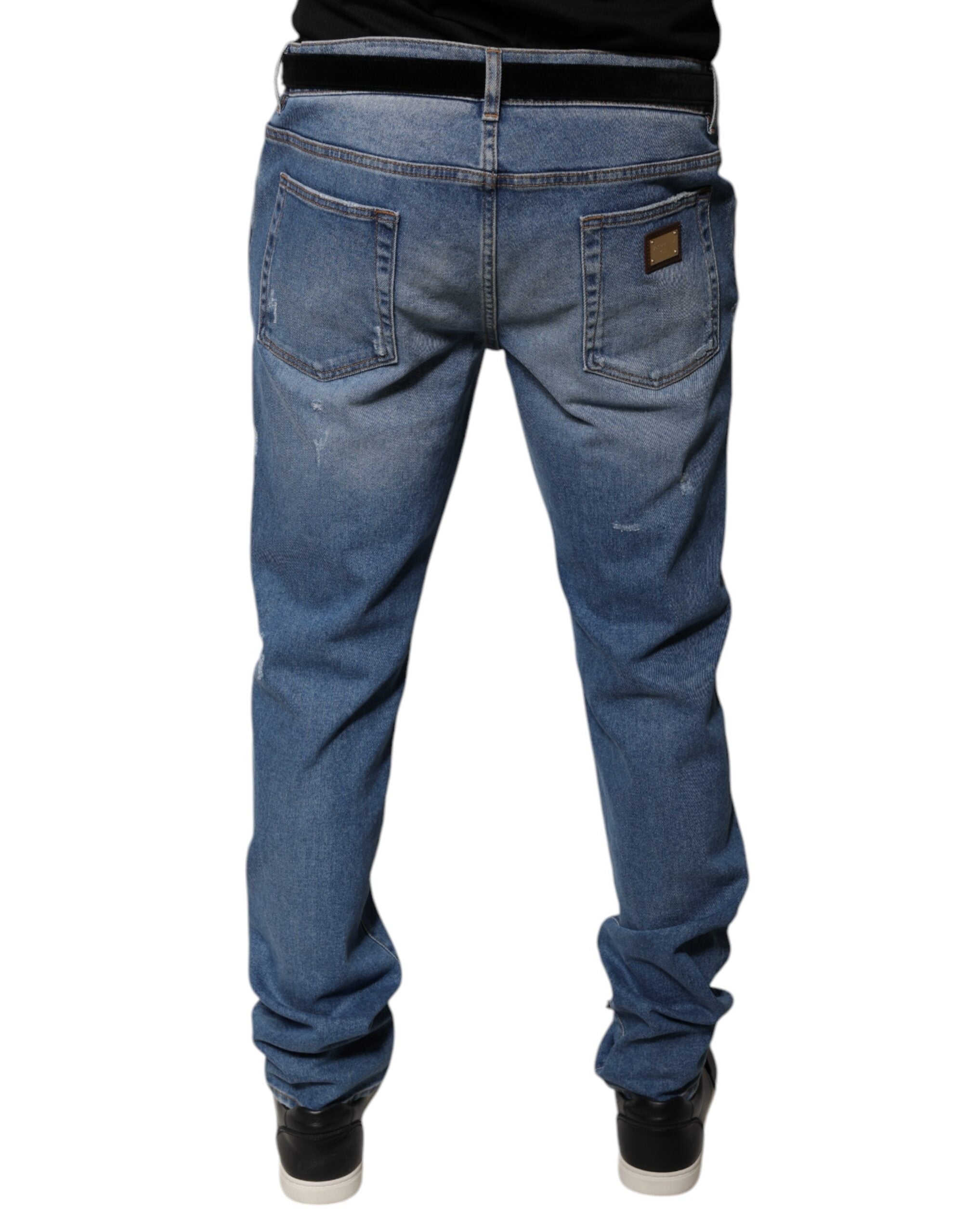 Jeans skinny en denim coton pour homme de Dolce & Gabbana Light Blue, montrant la coupe ajustée et le détail du tissu.