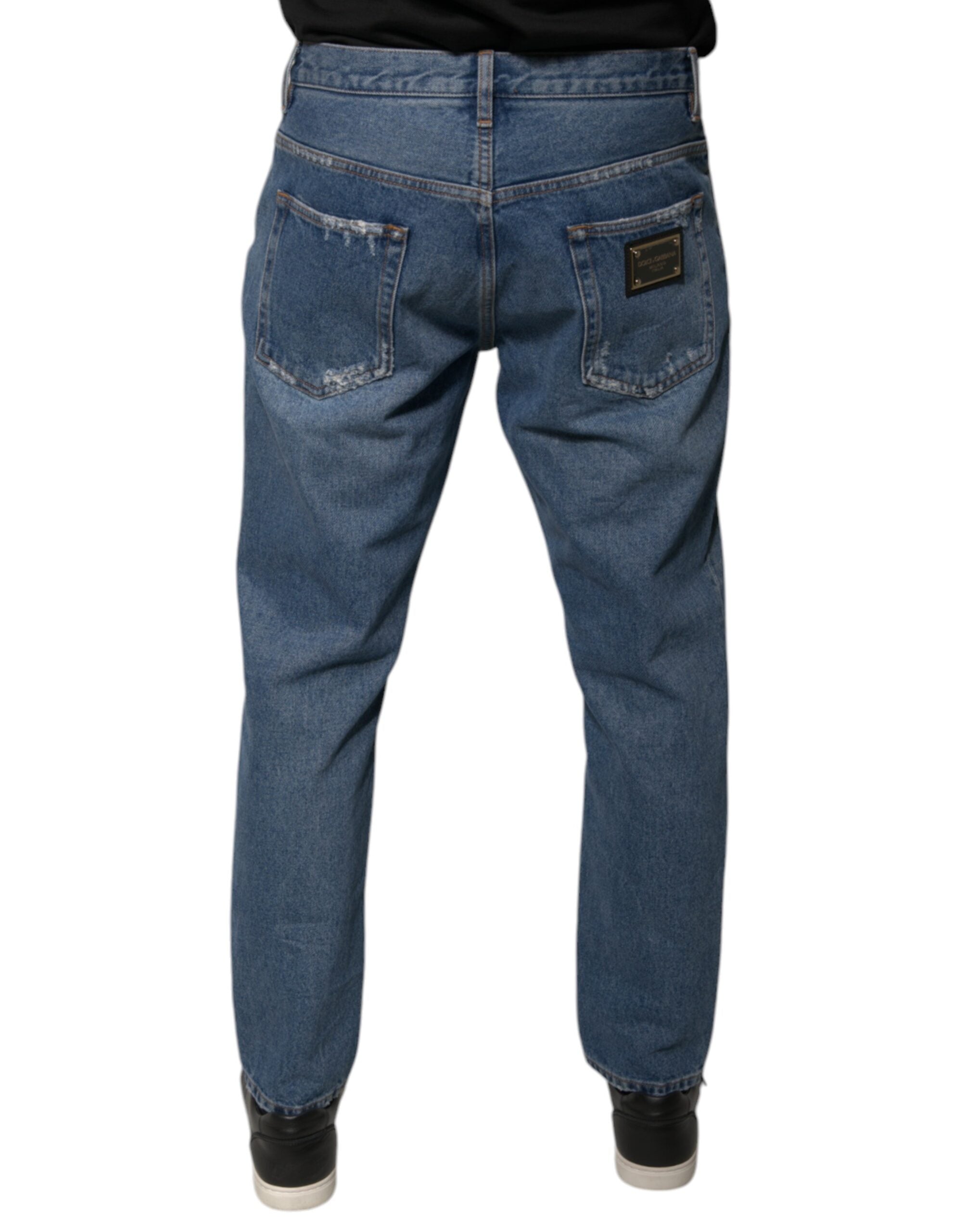 Jeans décontractés en denim bleu pour homme de Dolce & Gabbana avec logo en coton, style ample et moderne.