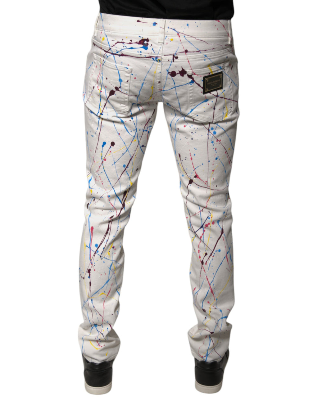 Jeans skinny en denim blanc à imprimé splash de couleur de Dolce & Gabbana.
