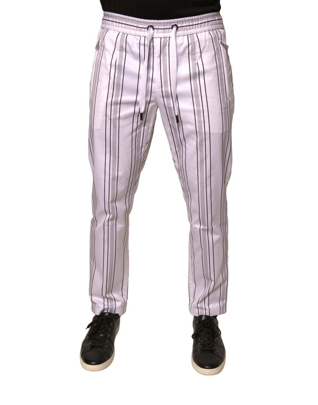 Pantalon skinny en coton à rayures blanches de Dolce & Gabbana, style élégant et confortable, visible avec détails de rayures.
