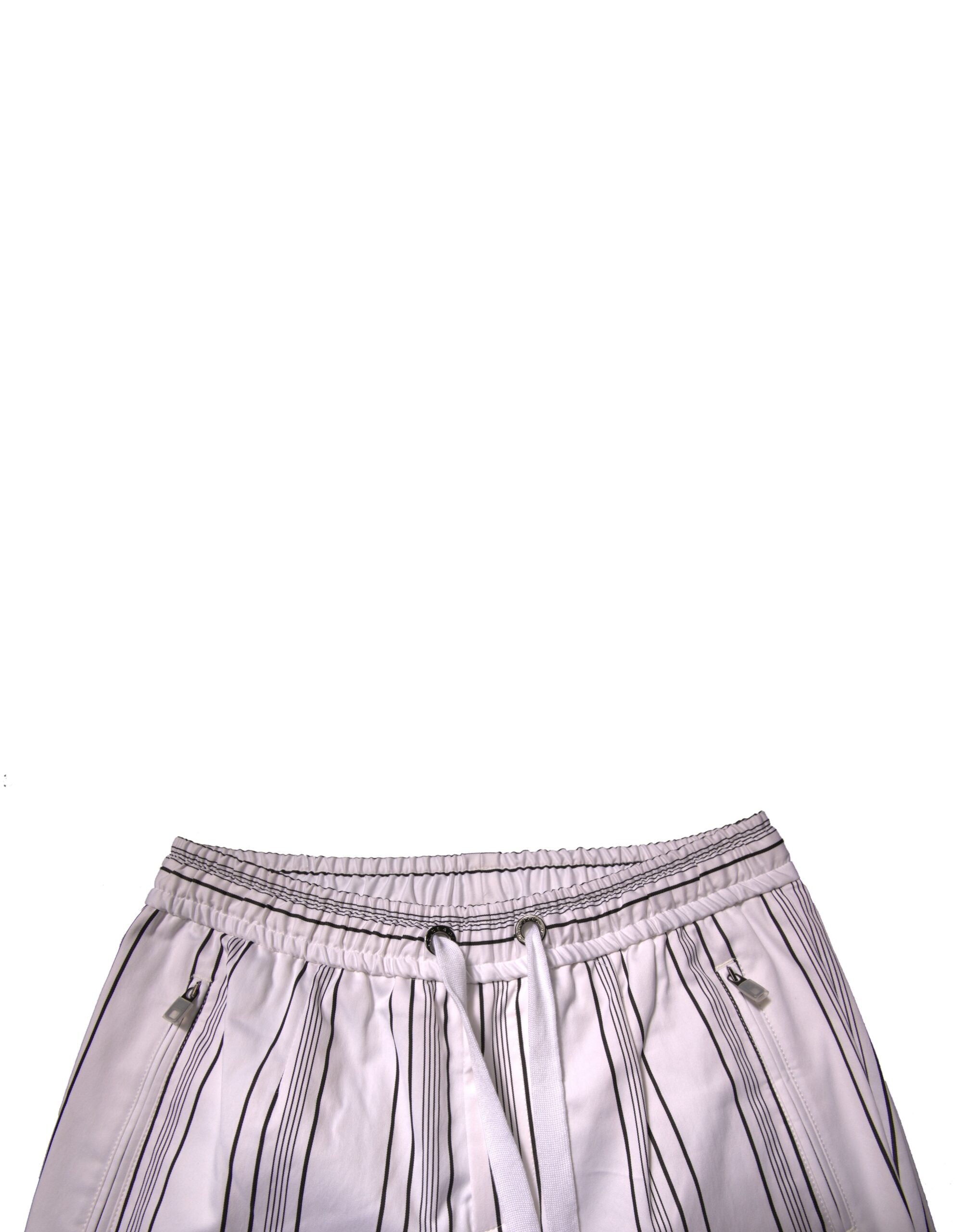 Pantalon skinny en coton blanc à rayures Dolce & Gabbana, style élégant et confortable, visible en détail dans l'image.