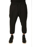 Pantalon jogging noir en laine de Dolce & Gabbana, style décontracté avec ceinture élastique et poches latérales.