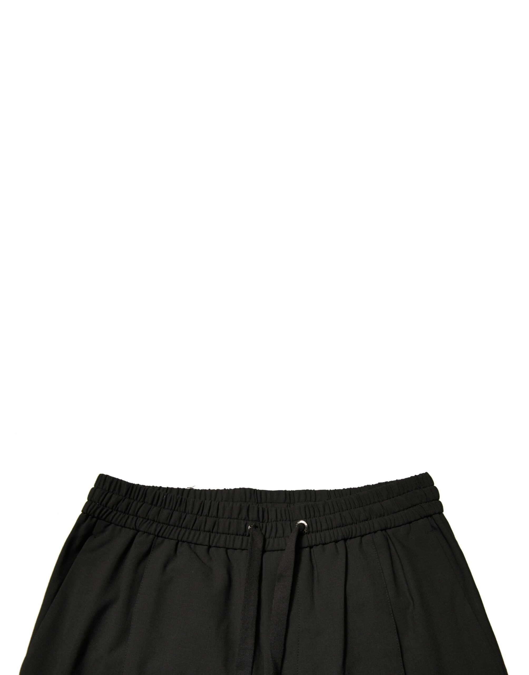 Pantalons de jogging noirs en laine Dolce & Gabbana, style décontracté avec ceinture élastique et poches latérales.