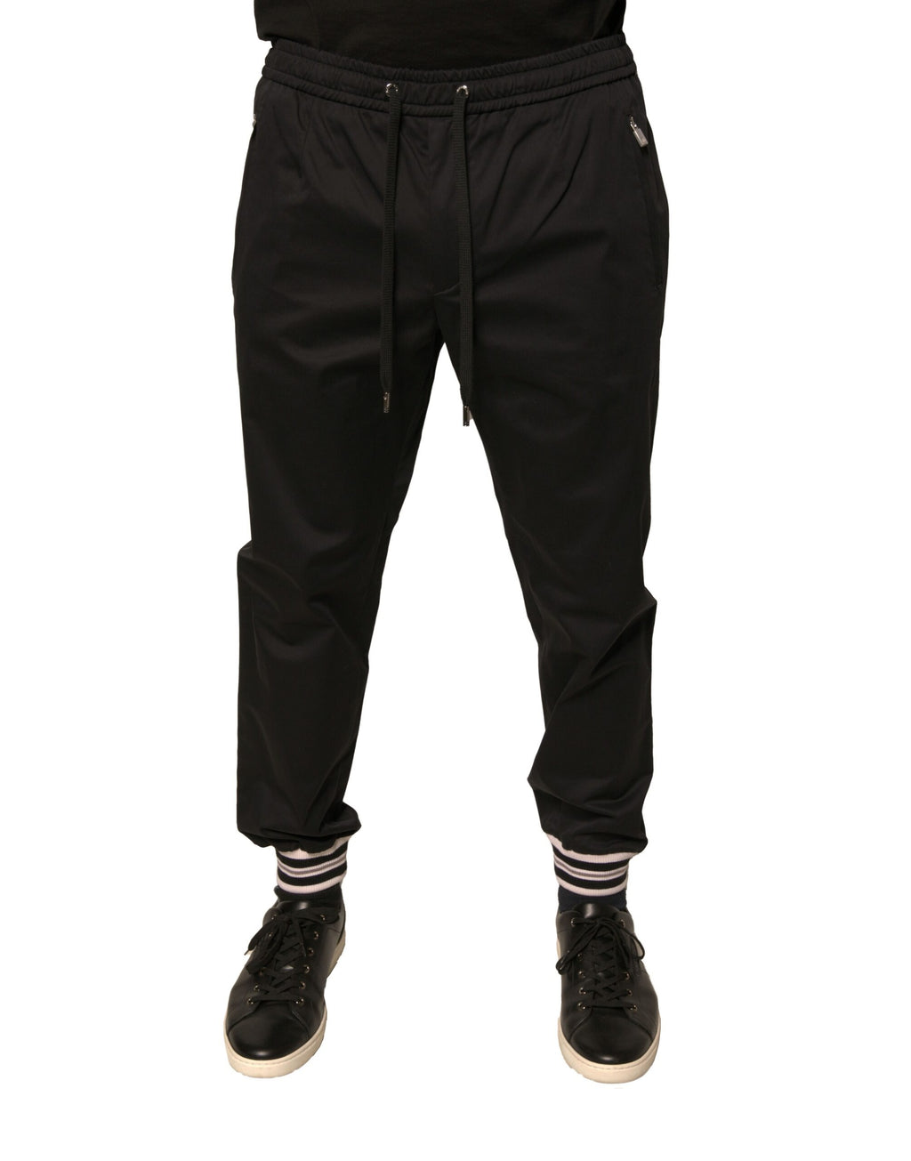 Pantalon de jogging Dolce & Gabbana en coton stretch noir, avec ceinture élastique et poches latérales, vue de face.
