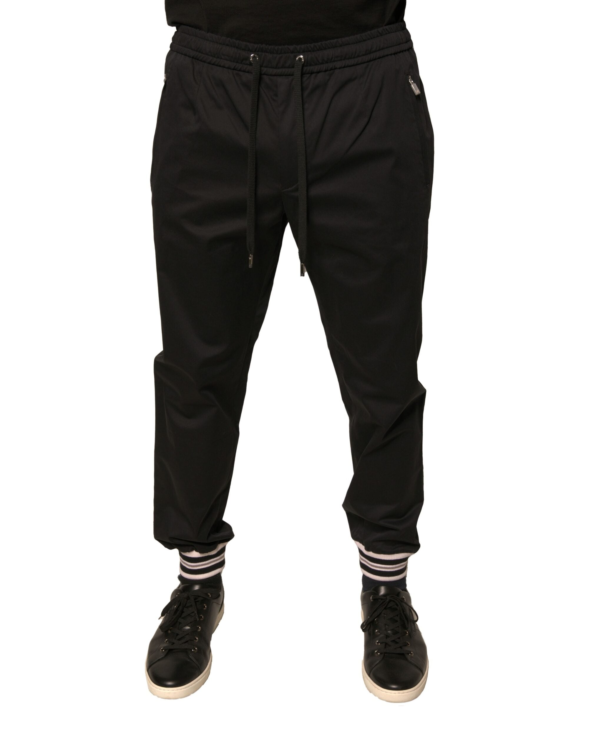 Pantalon de jogging Dolce & Gabbana en coton stretch noir, avec ceinture élastique et poches latérales, vue de face.