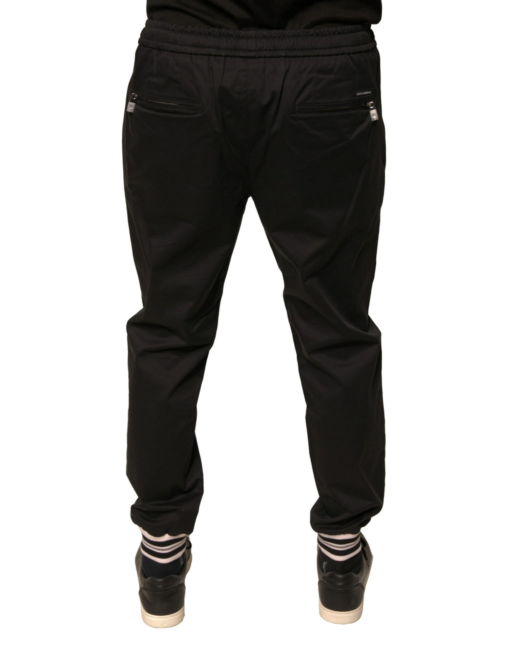 Pantalons de jogging Dolce & Gabbana en coton noir avec ceinture élastique et poches latérales, style décontracté et élégant.