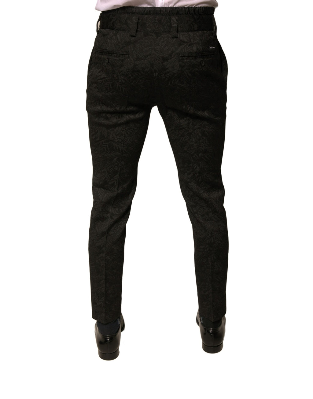 Pantalon homme Dolce & Gabbana en polyester brocart noir, coupe skinny, style élégant et sophistiqué.