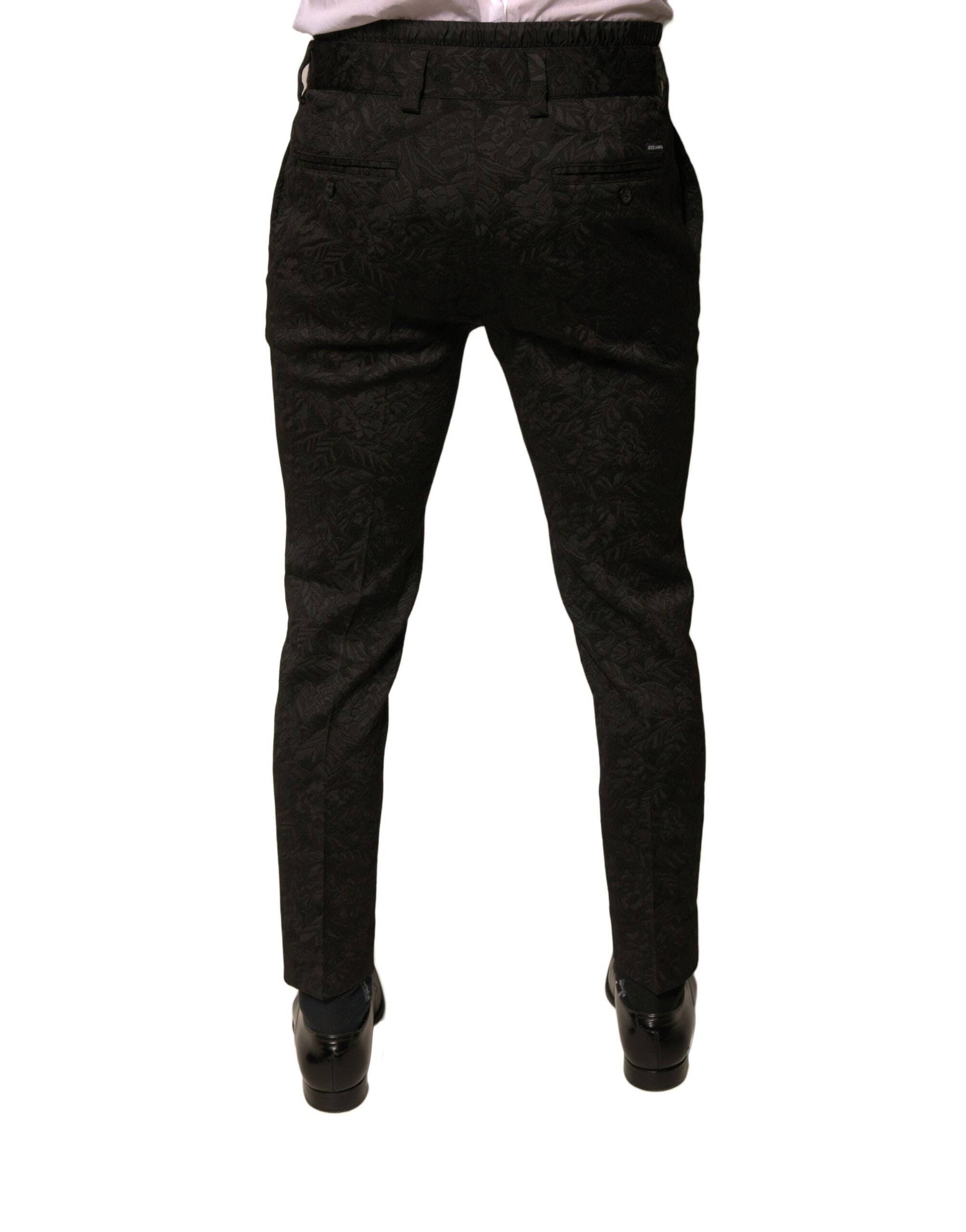Pantalon homme Dolce & Gabbana en polyester brocart noir, coupe skinny, style élégant et sophistiqué.