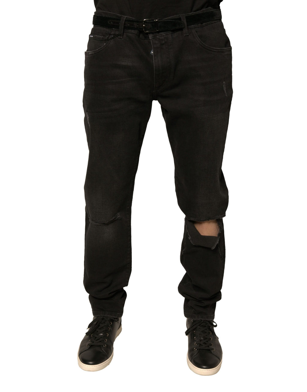 Jeans skinny en denim noir Dolce & Gabbana avec déchirures, logo brodé, coupe ajustée et détails modernes.