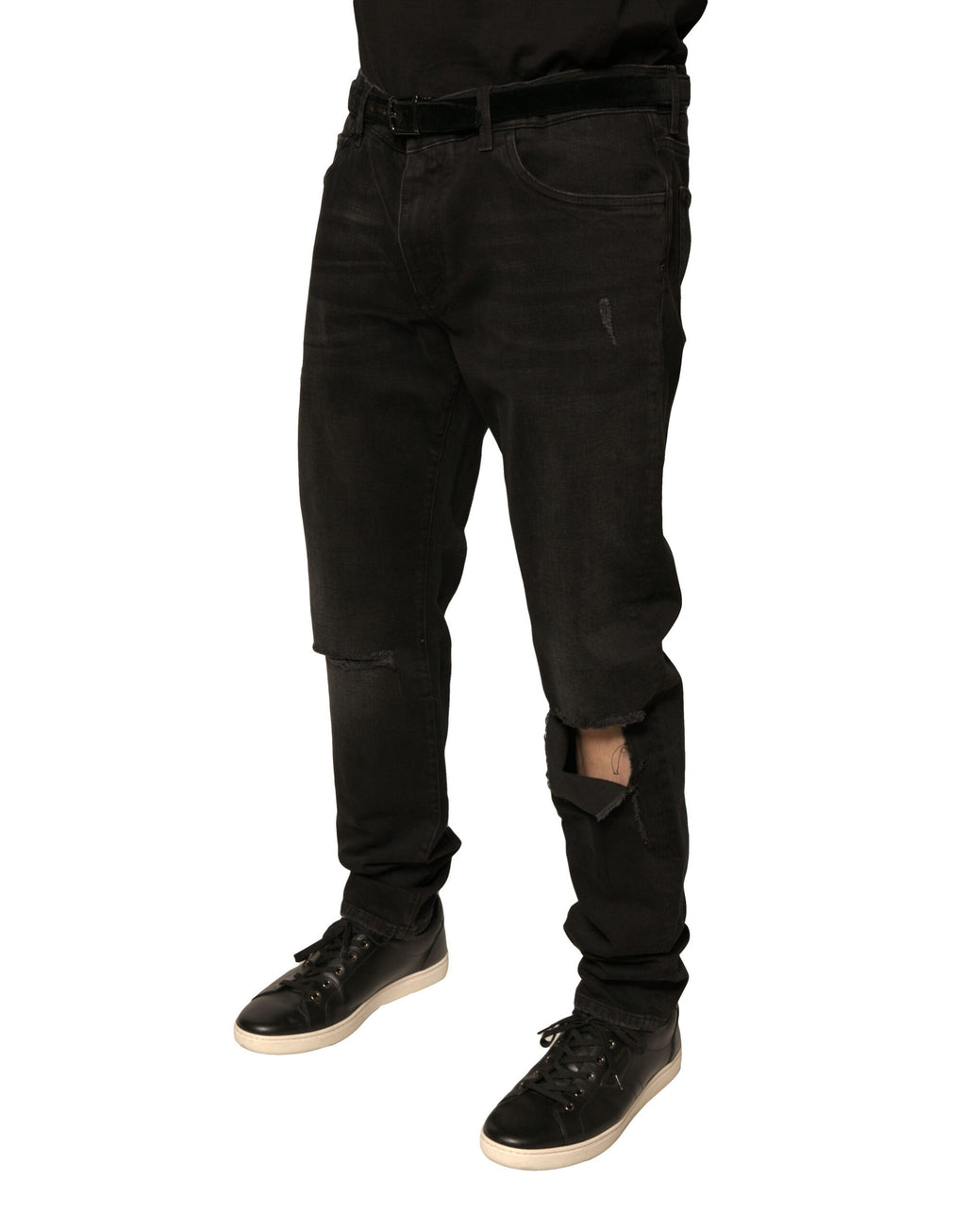 Jean skinny en denim coton noir Dolce & Gabbana avec déchirures et logo, style tendance et décontracté.