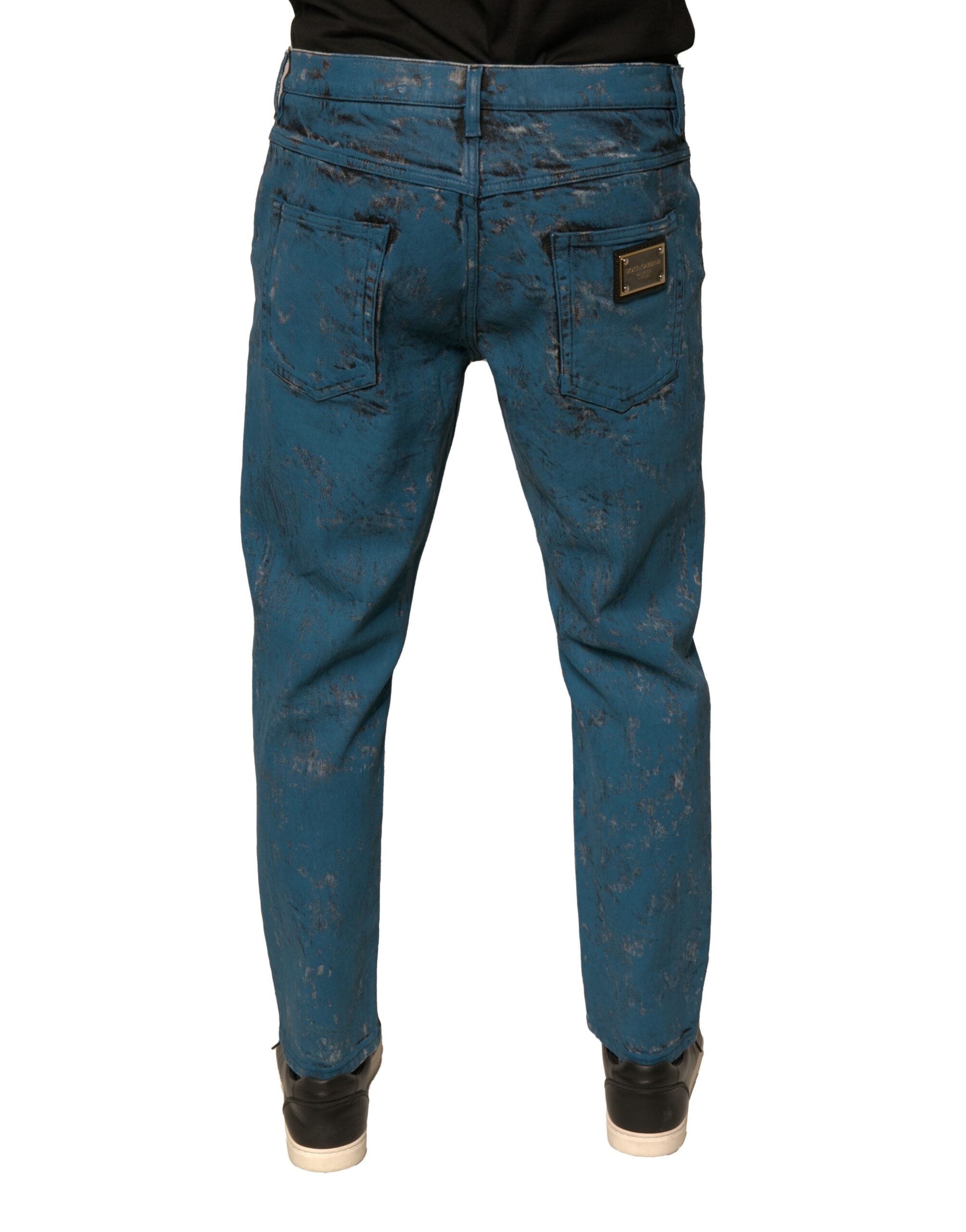 Jeans skinny en coton stretch Dolce & Gabbana bleu avec logo, visibles sur l'image, style denim ajusté et tendance.