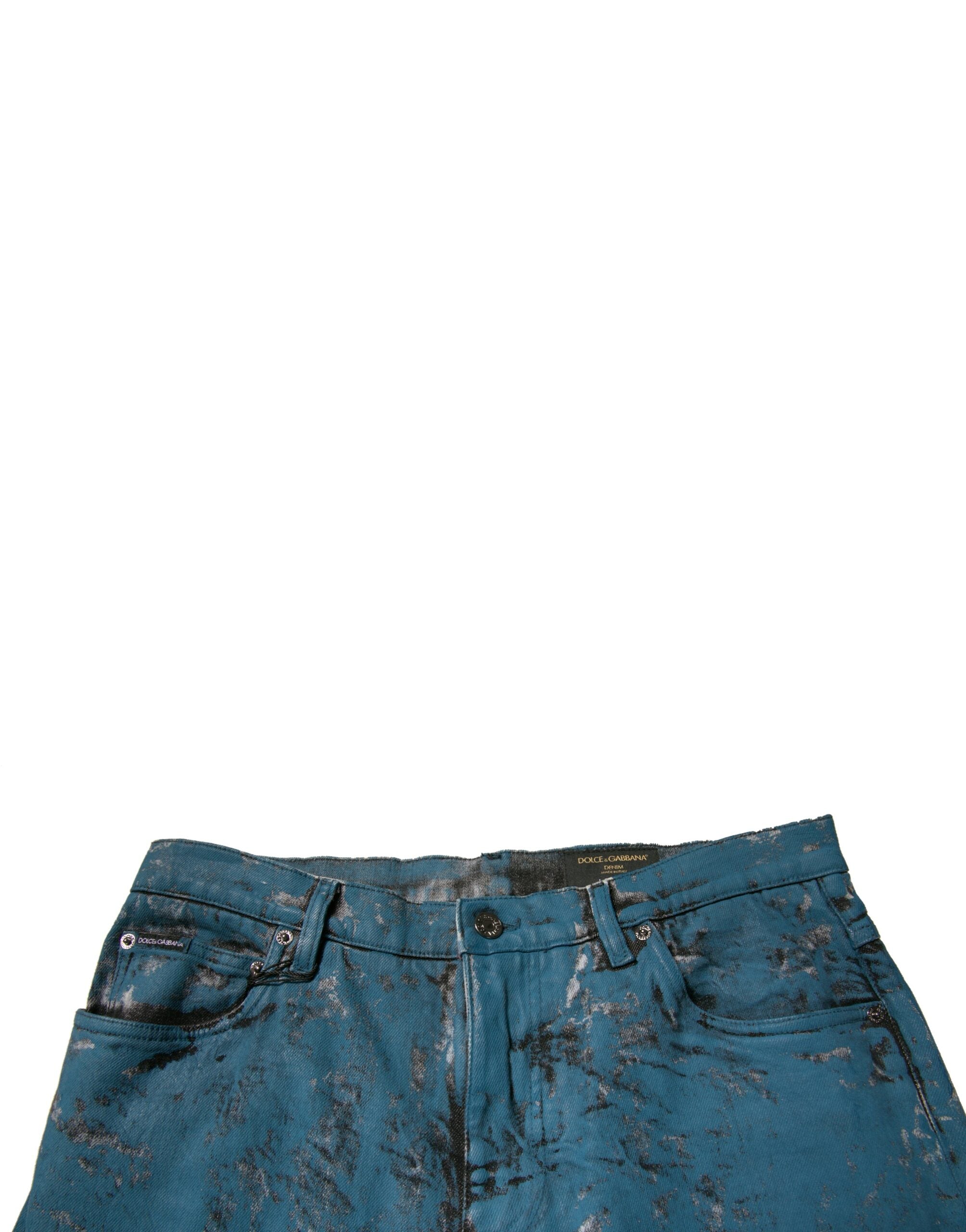 Jeans skinny en denim coton stretch bleu avec logo Dolce & Gabbana, vue de face.