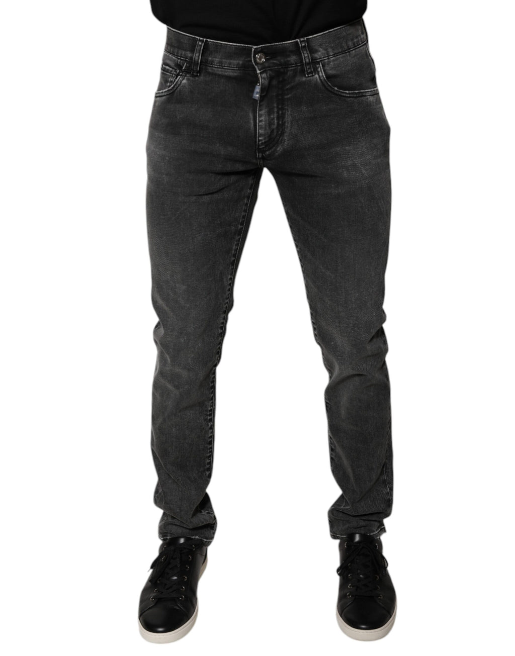 Pantalons en jean skinny noir Dolce & Gabbana avec logo en coton stretch, ajustés et modernes, visibles sur l'image.