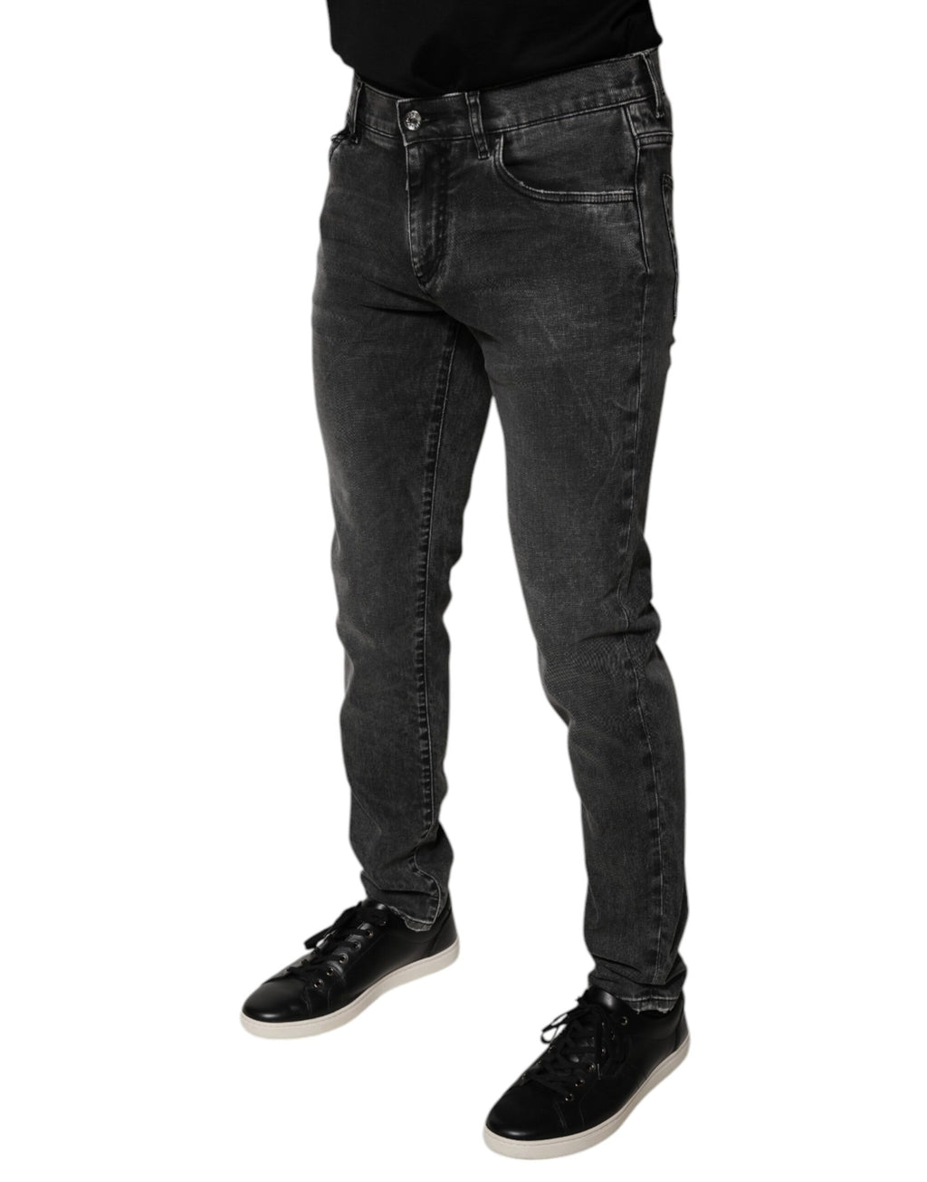 Pantalons skinny en denim stretch noir Dolce & Gabbana avec logo en coton, vue de face sur fond neutre.