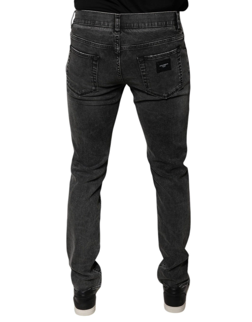 Pantalons en denim skinny noir Dolce & Gabbana en coton stretch avec logo visible, pour un look élégant et ajusté.