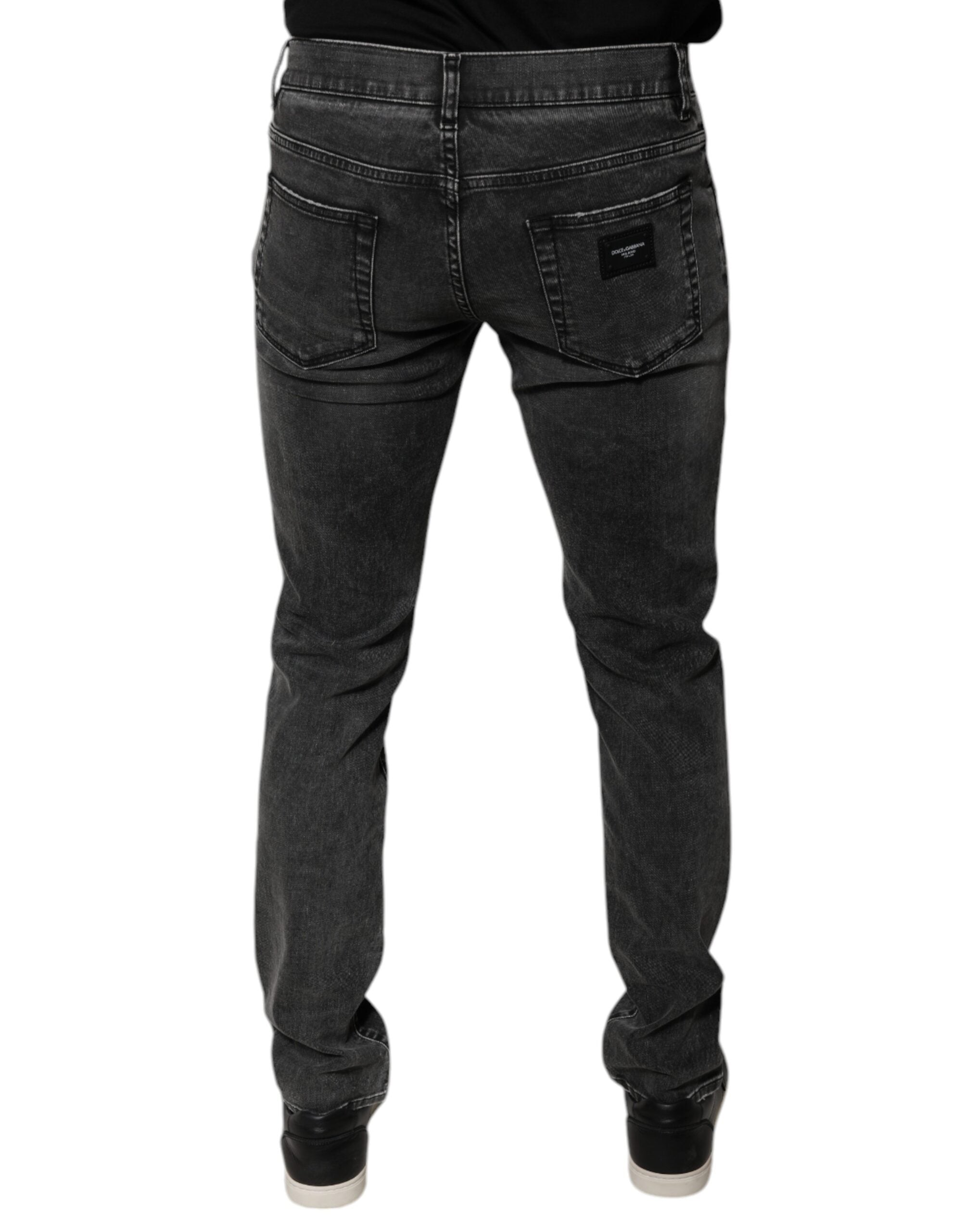Pantalons en denim skinny noir Dolce & Gabbana en coton stretch avec logo visible, pour un look élégant et ajusté.